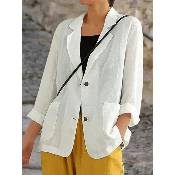 Effortless white women's button-up cardigan, lightweight with relaxed fit & 3/4 sleeves. Ideal for everyday casual layering.