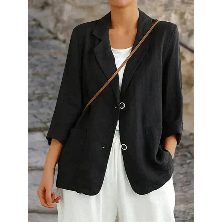 Chic black women's button-up cardigan, lightweight and versatile with 3/4 sleeves. Great for casual & smart-casual layering.