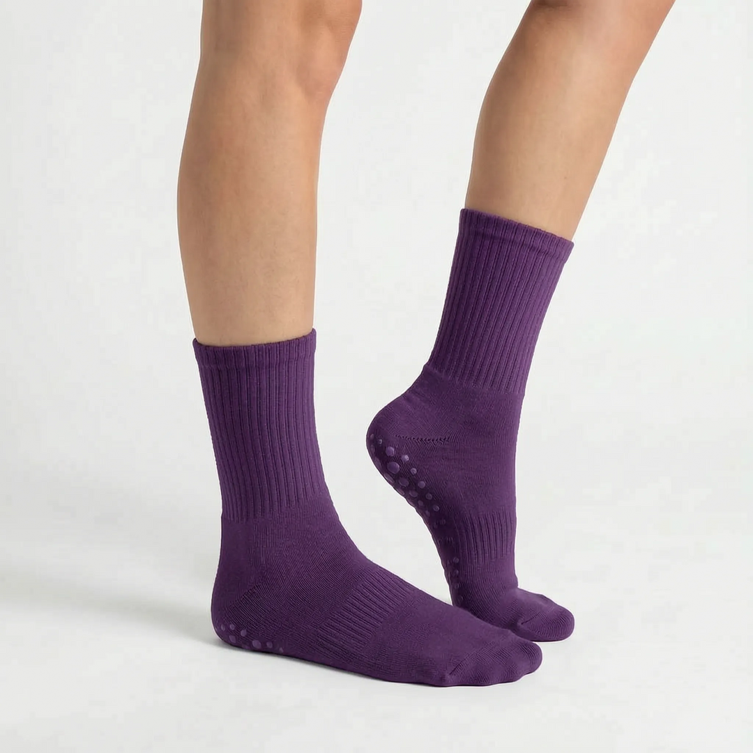 Lilac activewear grippy crew socks for women, providing non-slip stability during yoga & Pilates studio workouts.