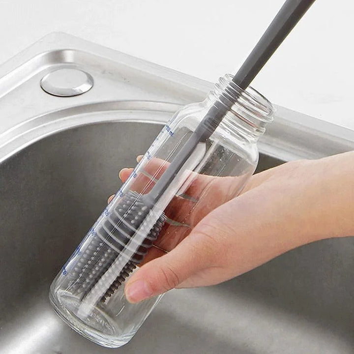 Durable silicone baby bottle brush with a long handle, essential for nursing and kitchen cleaning 125 characters