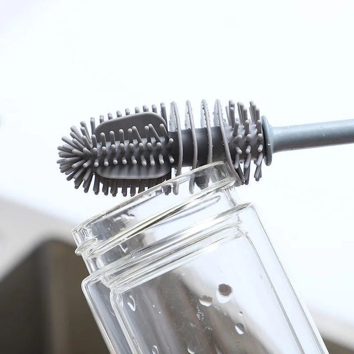 Soft gray silicone bristles on a long handle bottle brush, perfect for gentle yet thorough cleaning 125 characters
