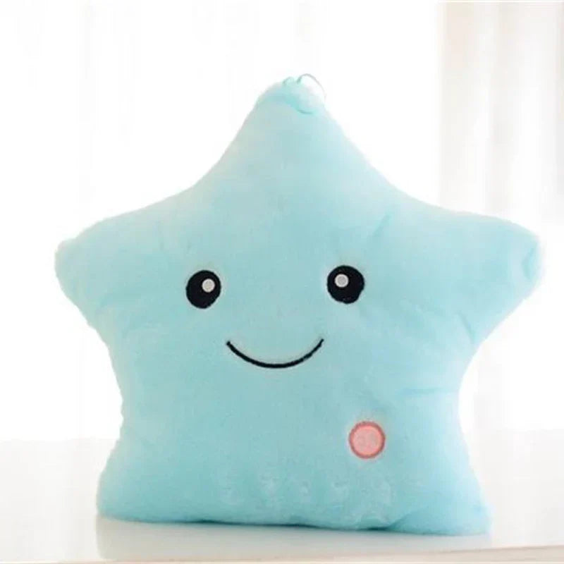 Soft star plush pillow with gentle glow, ideal night light and comfort item for kids.