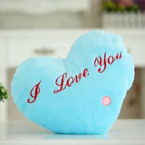 Pink luminous heart plush pillow, sweet kids' room decor, soft glowing night light function.