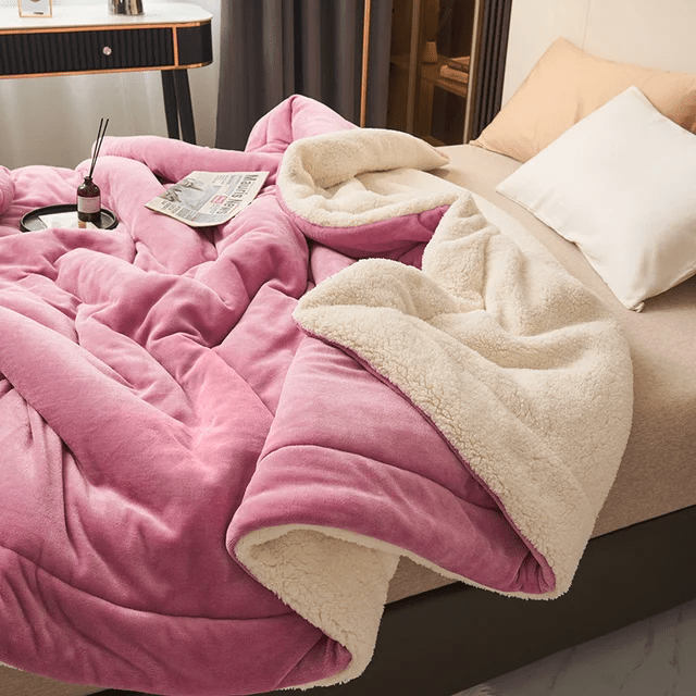 Stylish fleece blanket, plush texture, enhances bedroom decor while providing ultimate warmth and comfort.