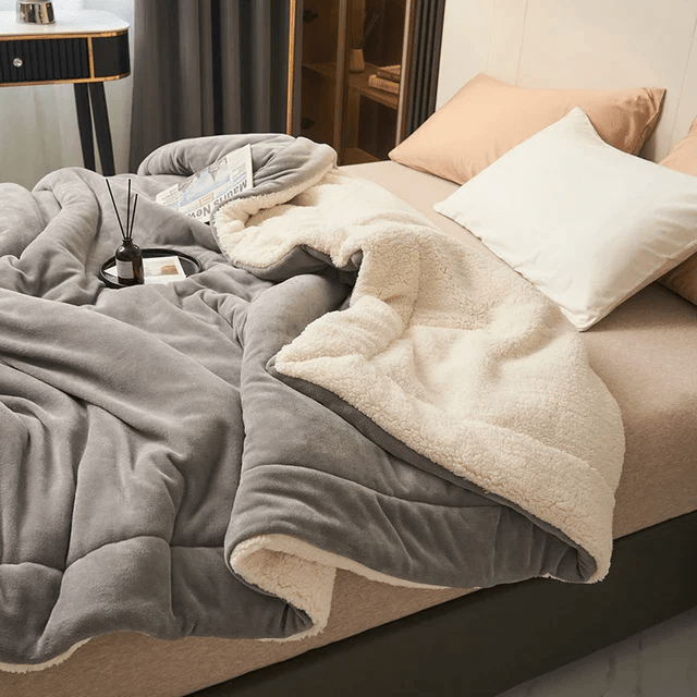 Cozy fleece blanket for bedroom, ultimate comfort, adds warmth & stylish home decor.