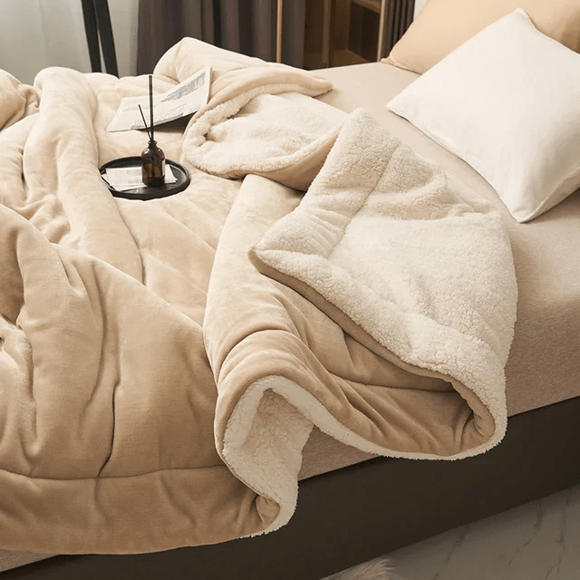 Durable unisex fleece blanket, easy care, plush and warm, a cozy bedroom accessory for ultimate comfort.