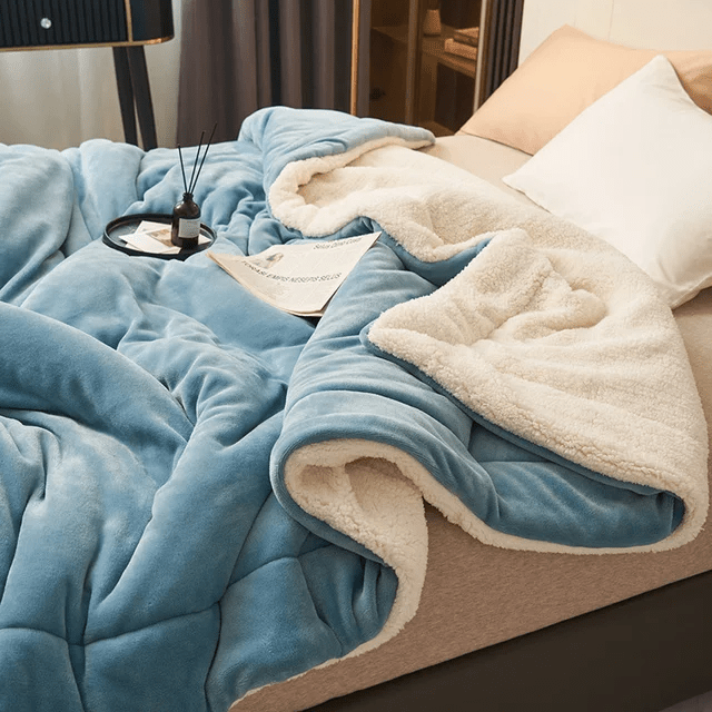 Warm fleece blanket, ultimate comfort, perfect for chilly nights, a cozy addition to any home.