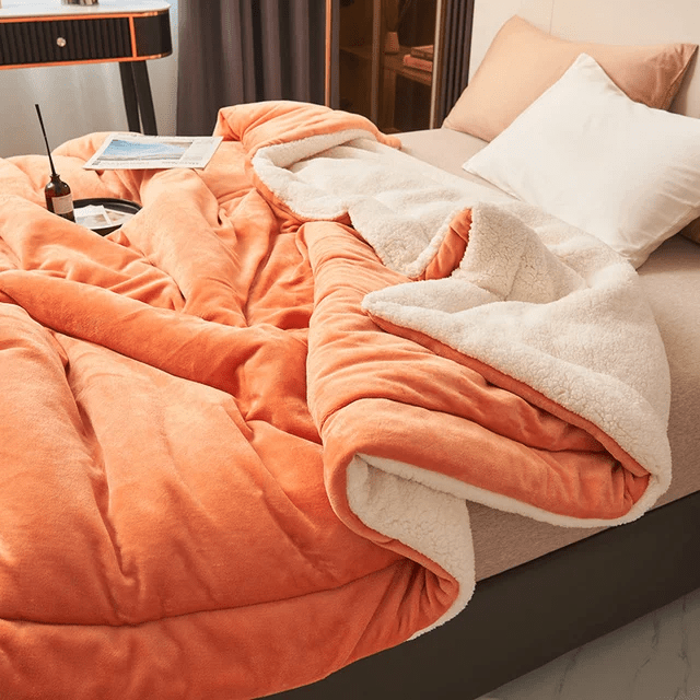 Easy-care durable fleece blanket, luxurious and soft, a versatile warm throw for home comfort.