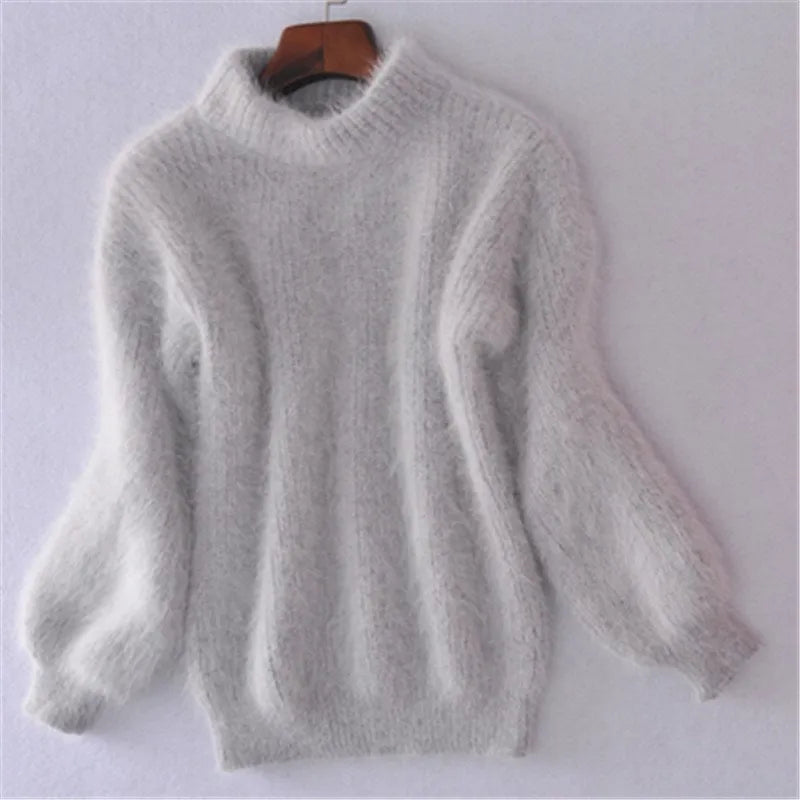 Elegant women's warm pullover. Soft long sleeve sweater for timeless style & comfortable wear in winter fashion.