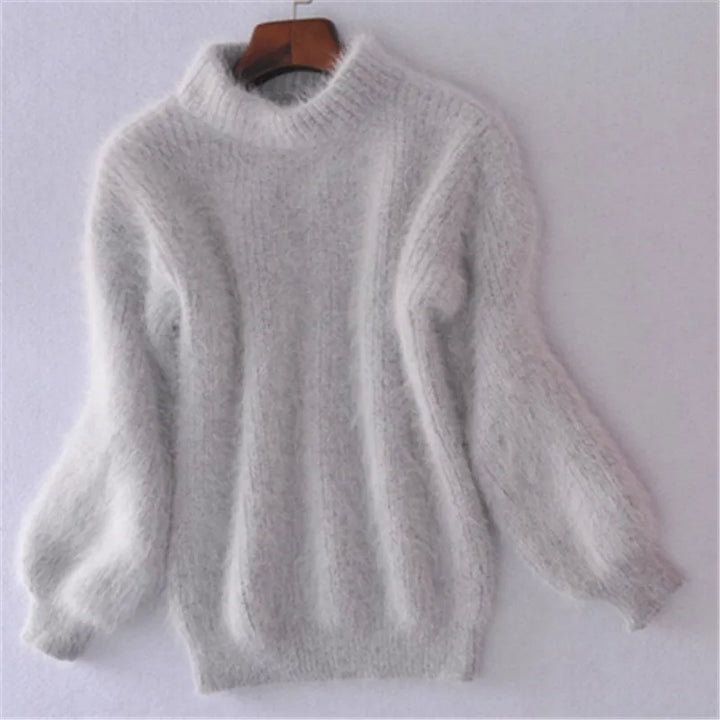 Elegant women's warm pullover. Soft long sleeve sweater for timeless style & comfortable wear in winter fashion.