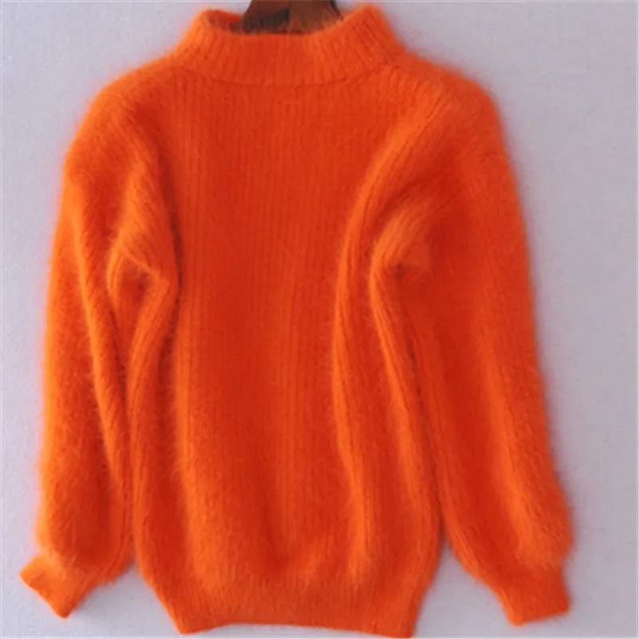 Luxurious soft women's sweater. Plush, comfortable long sleeve pullover, great for versatile winter fashion.