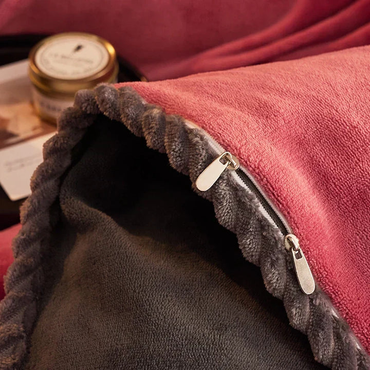 Beautiful velvet fleece comforter set on a bed, creating a warm and inviting bedroom ambiance.