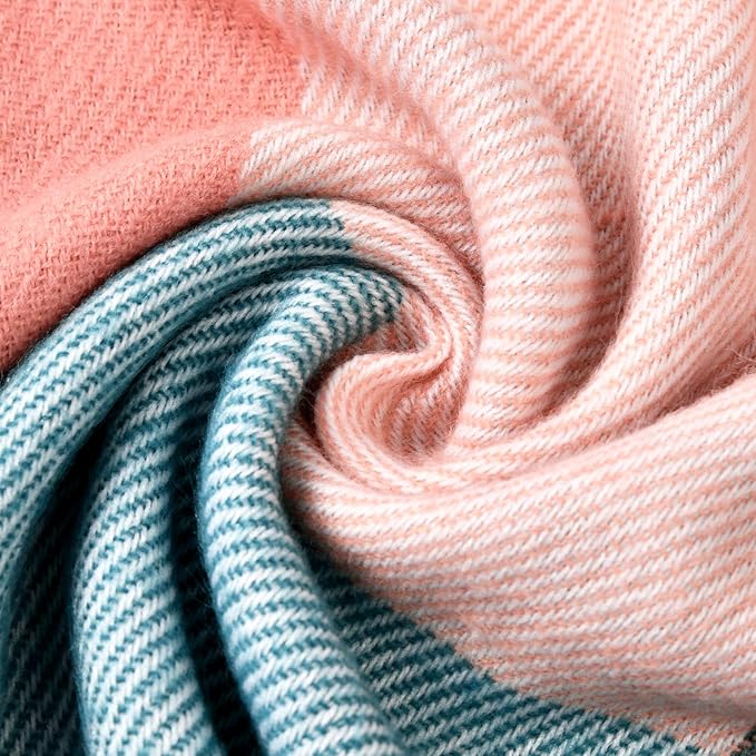 Warm women's cashmere wrap, soft, checked pattern, ideal for winter style.