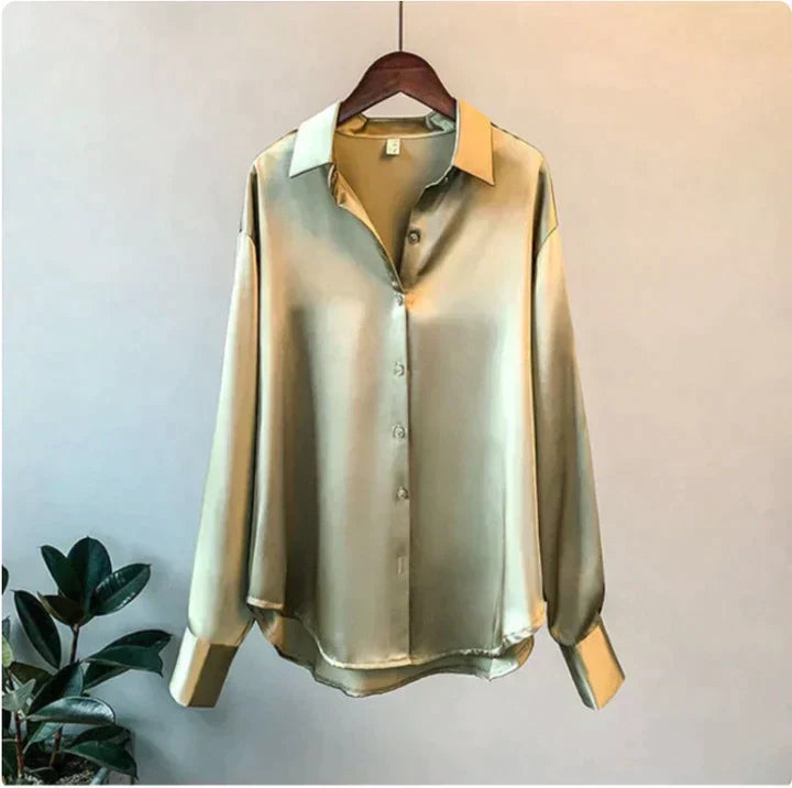 Versatile women's button-up shirt, relaxed fit. Perfect elegant top for everyday luxury and effortless style.