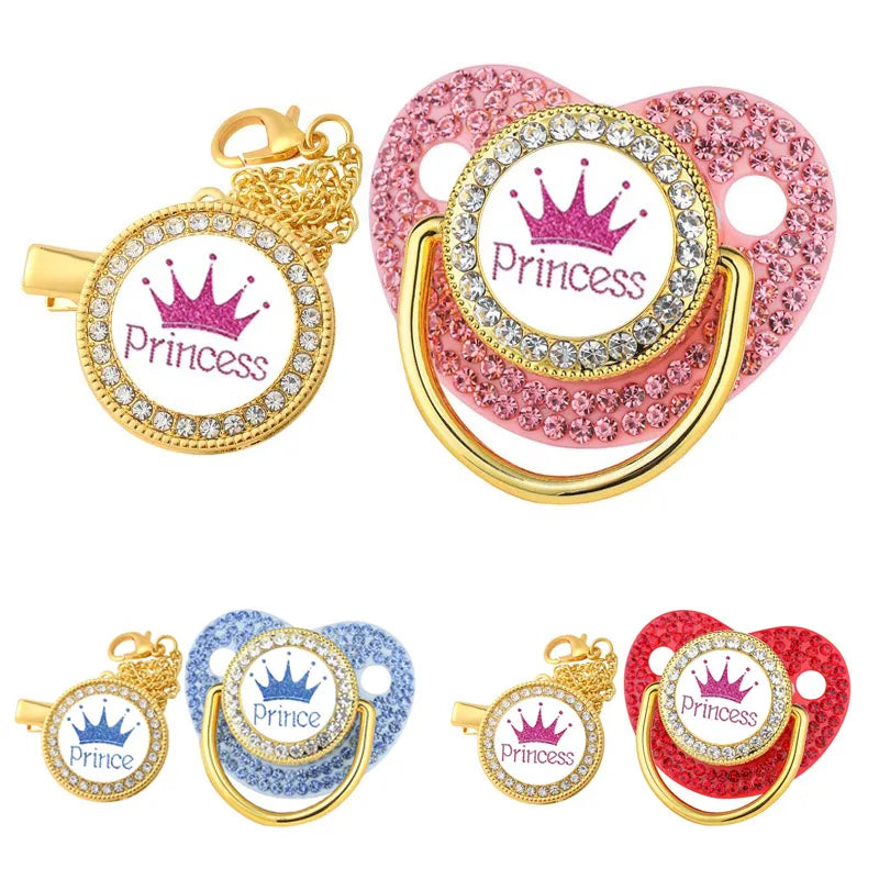 Luxury gold crown baby pacifier & clip set for newborns. BPA-free silicone infant comfort.