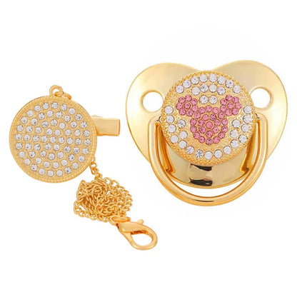Infant essentials: Soft silicone pacifier & matching clip with a gold crown design.
