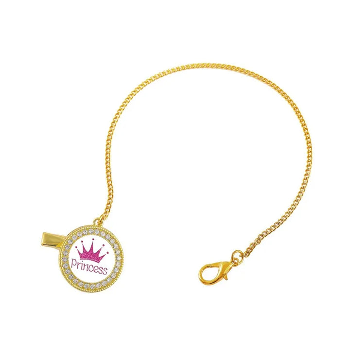 Comfort and luxury: gold crown baby pacifier and clip, perfect for little ones.