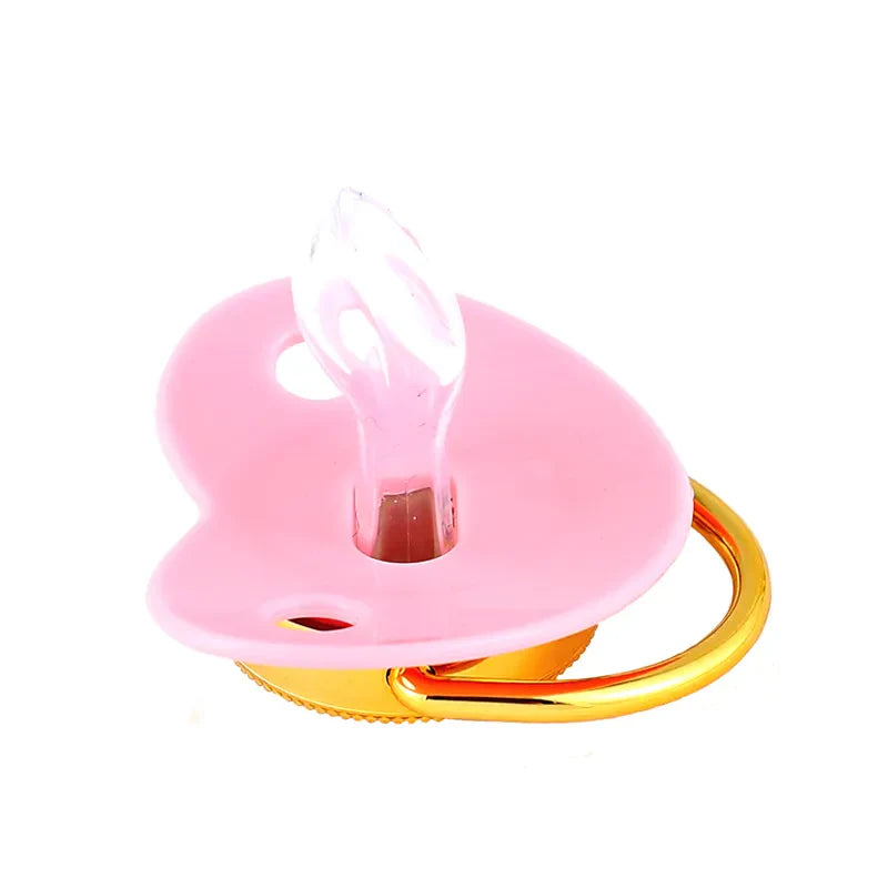 Premium baby shower gift: gold crown pacifier set, BPA-free for infant comfort.