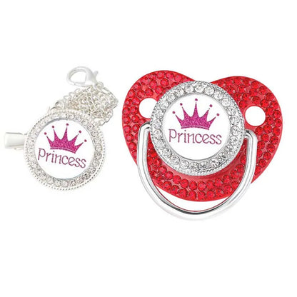 Ergonomic silicone baby teether and pacifier with a sophisticated crown design.