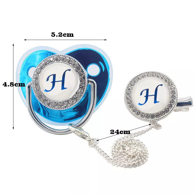 Glamorous baby pacifier, unisex, covered in sparkling rhinestones with a secure clip