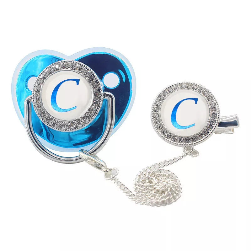 Unisex rhinestone baby pacifier with an ergonomic clip, a glam accessory for babies