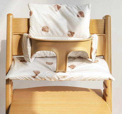 Machine washable cotton cushion for baby high chair, providing extra comfort and support during mealtime.