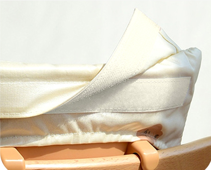 Soft, comfortable high chair seat cushion for infant and toddler, easy to clean and essential baby furniture accessory.