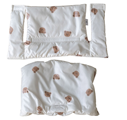 Highchair cushion in a neutral tone, designed for baby comfort and support, fully washable for easy maintenance.