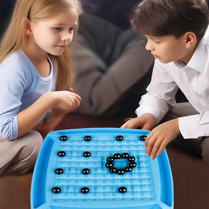 Two people playing magnetic chess, engaging in a strategy board game, all ages fun