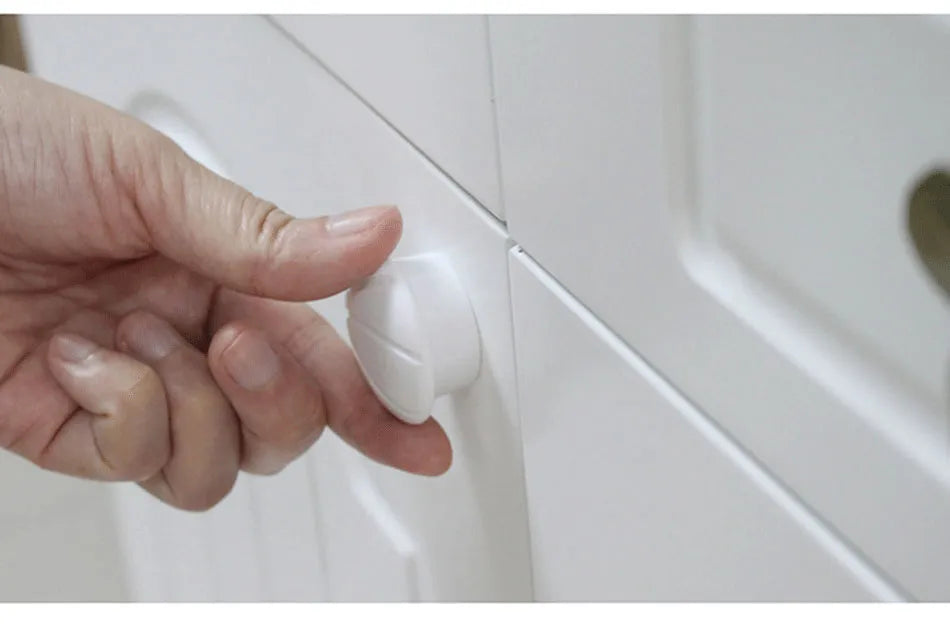 Child-proof cabinet with magnetic lock, offering peace of mind to parents for baby safety around the house.