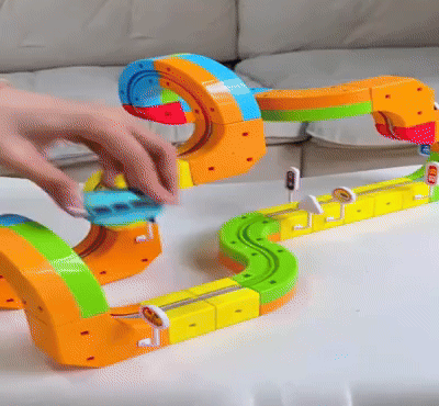 Educational magnetic blocks creating a multi-level train track for ages 3+