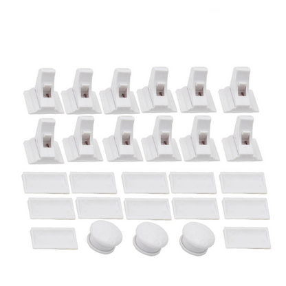 Set of magnetic childproof cabinet locks with installation template, securing drawers and cabinets.