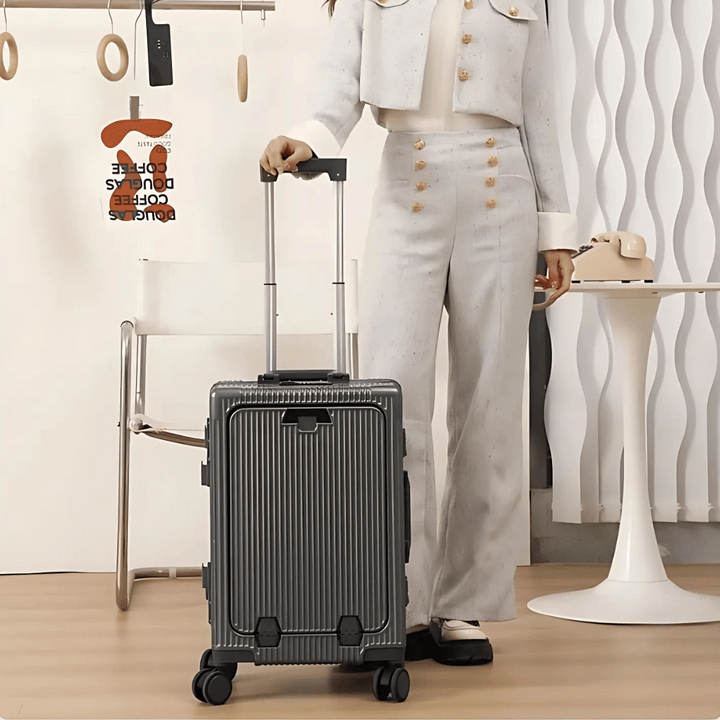 Unisex hard-shell carry-on luggage with integrated laptop compartment, perfect for business travel.