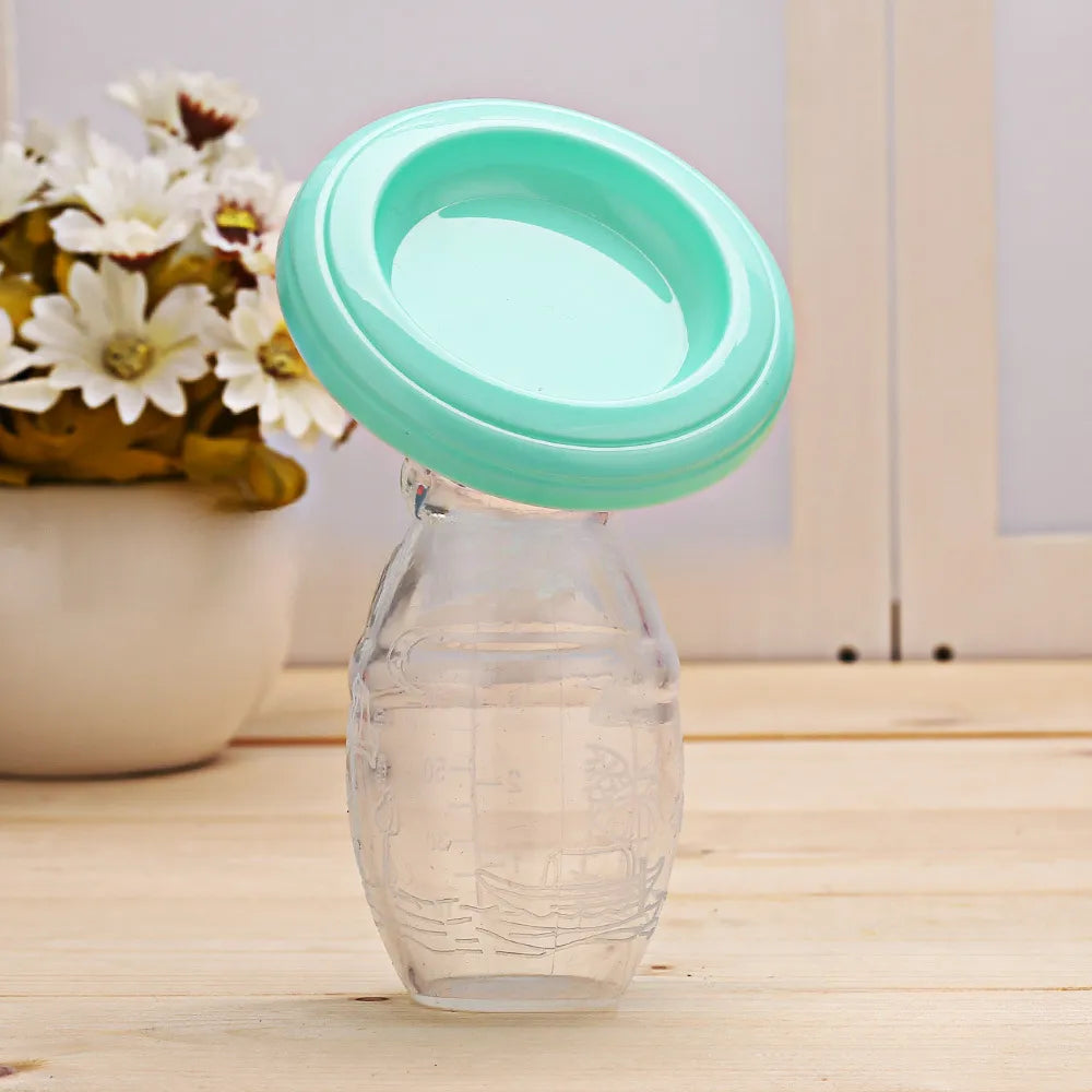 Milk collector: manual silicone breast pump with measurement markings for tracking volume