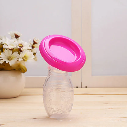 Manual silicone breast pump shown with its protective lid, hygienic milk storage