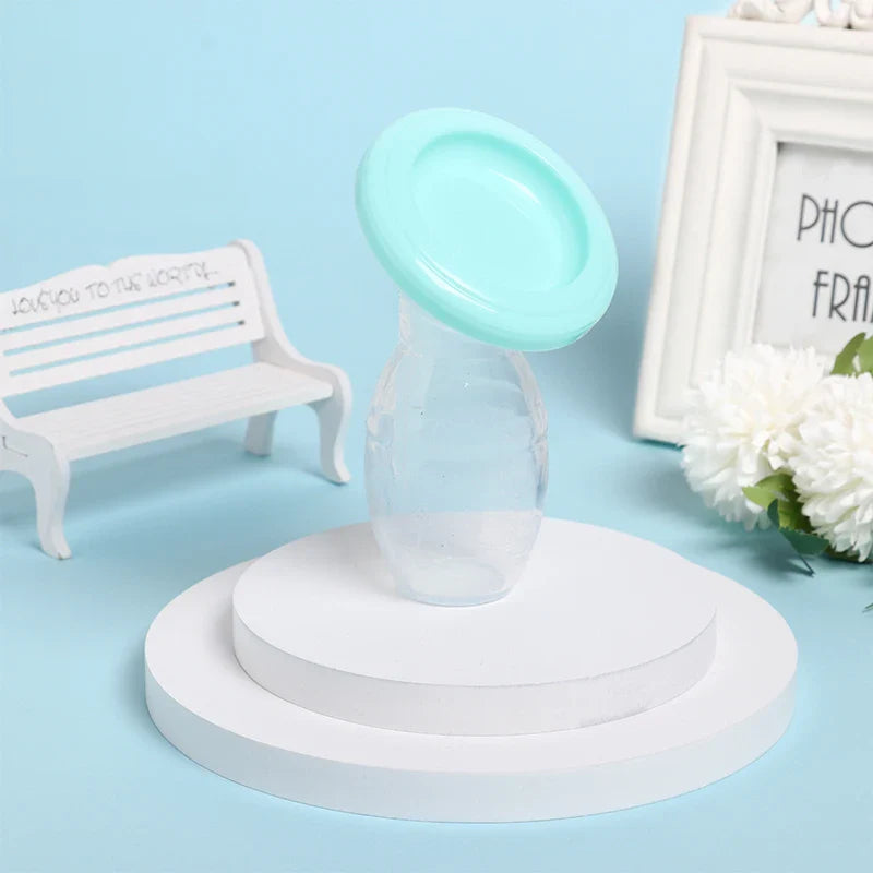 Manual silicone pump on a flat surface, illustrating stability with its suction base