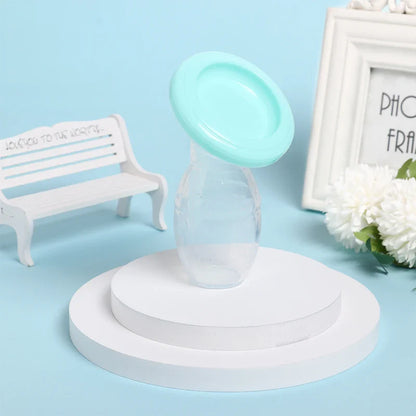 Manual silicone pump on a flat surface, illustrating stability with its suction base
