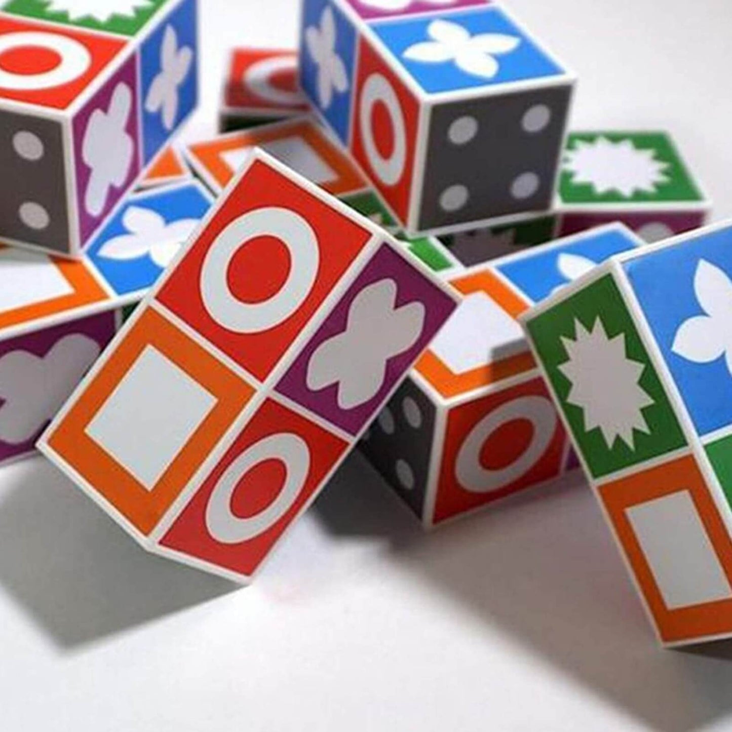 Close-up of Match Madness game blocks and challenge cards showcasing colorful geometric shapes