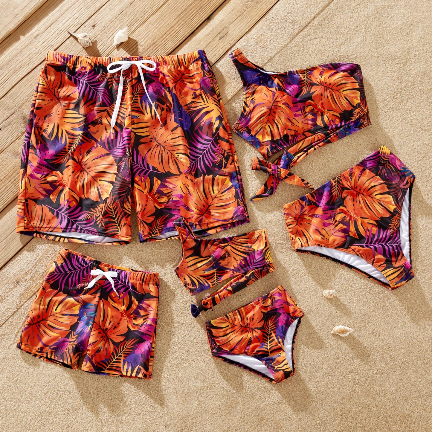 Matching family swimwear, vibrant floral print. Perfect for beach vacations & pool days.