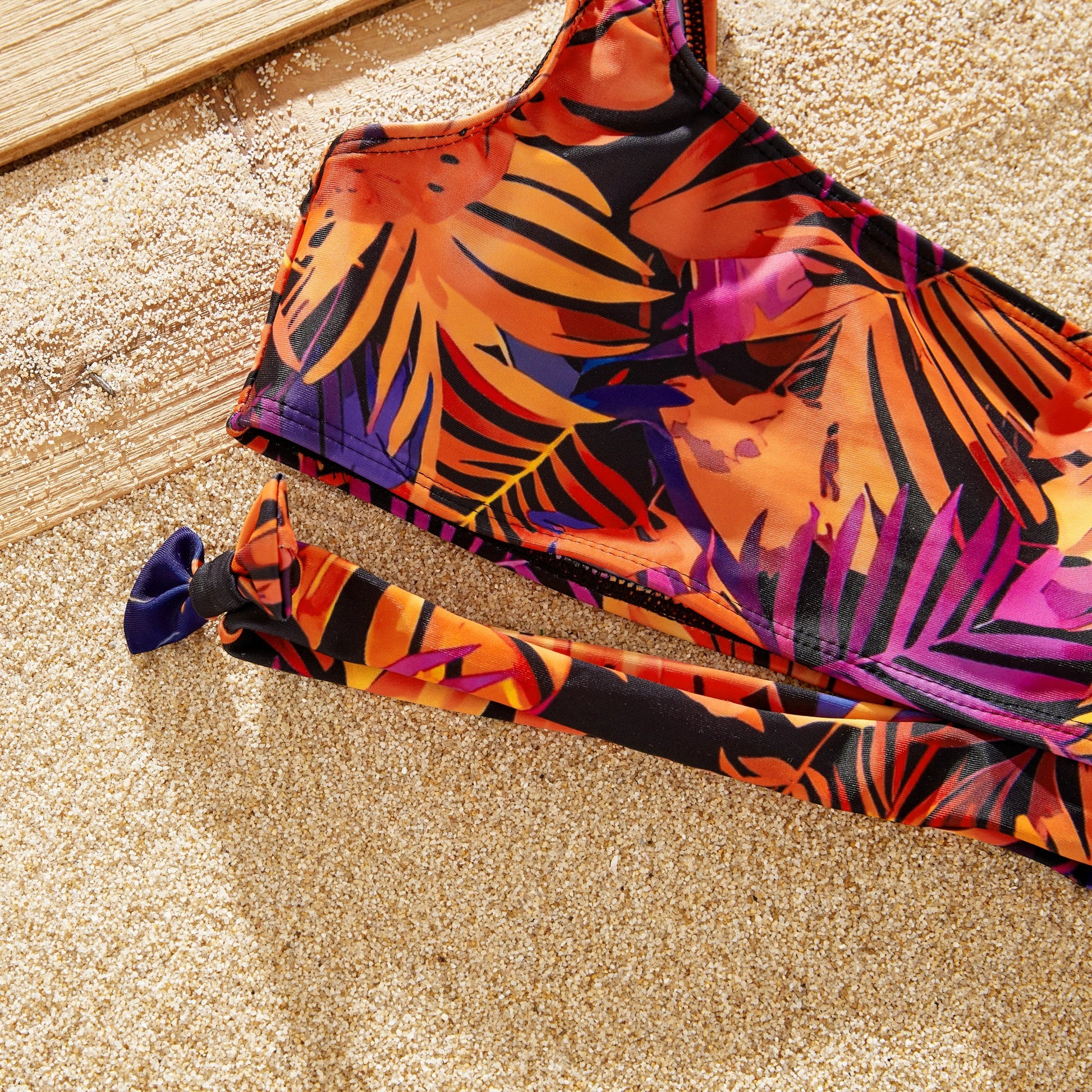 Boy's floral swim shorts, front view. Great kids' beachwear for pool & ocean.