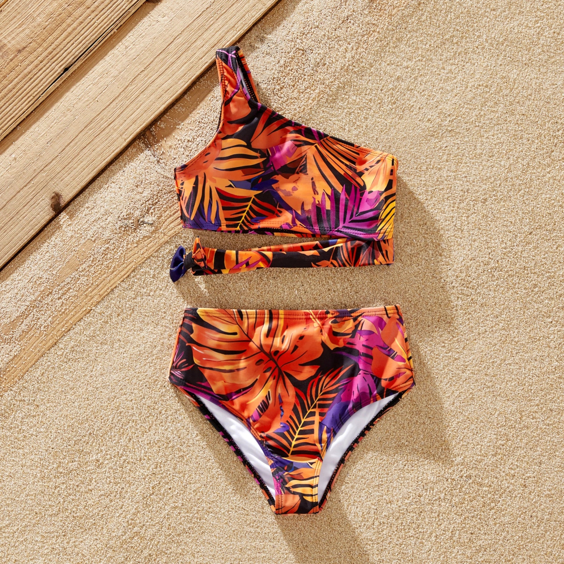 Mom & daughter matching floral bikinis. Stylish family swimwear for vacation.