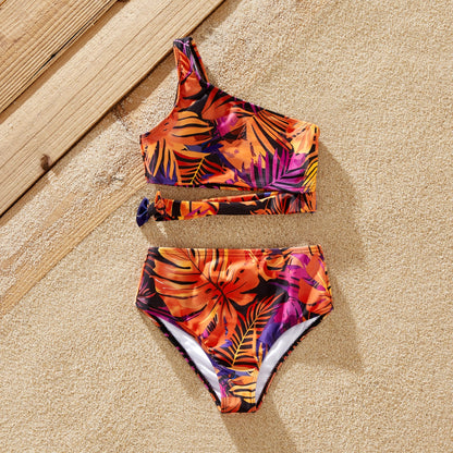 Mom & daughter matching floral bikinis. Stylish family swimwear for vacation.