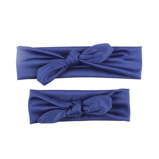 Matching pink bow headbands, a delightful baby girl accessory and mom's cute headwear