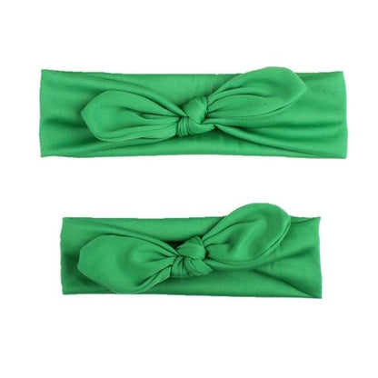 Adorable mother-daughter pink bow headbands, perfect infant accessories for photos
