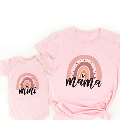 Matching women's shirt and baby romper, both in colorful rainbow cotton