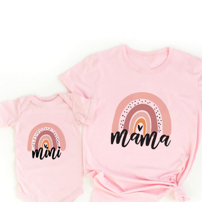 Matching women's shirt and baby romper, both in colorful rainbow cotton