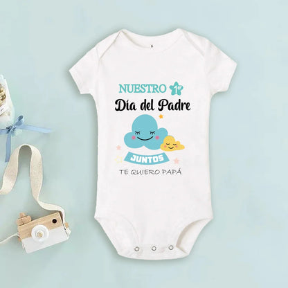 Happy dad and baby in coordinated First Father's Day family matching outfits, ideal occasion wear.