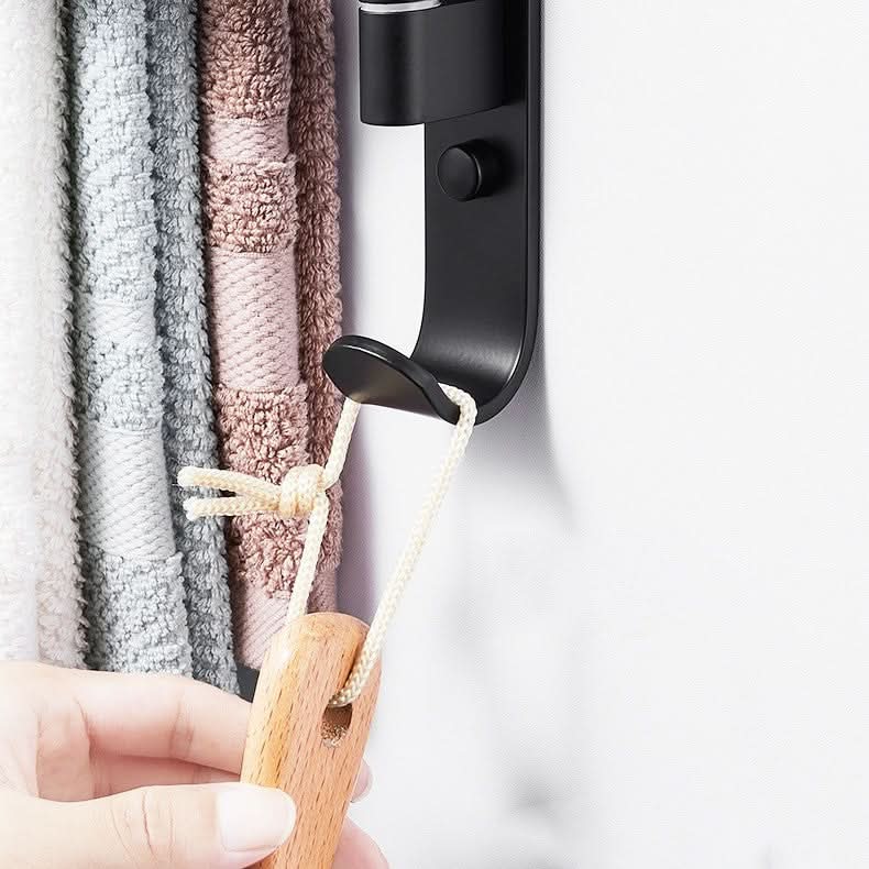 Modern matte black metal 5-arm swivel towel rack. Wall mount bathroom storage for elegant home organization.