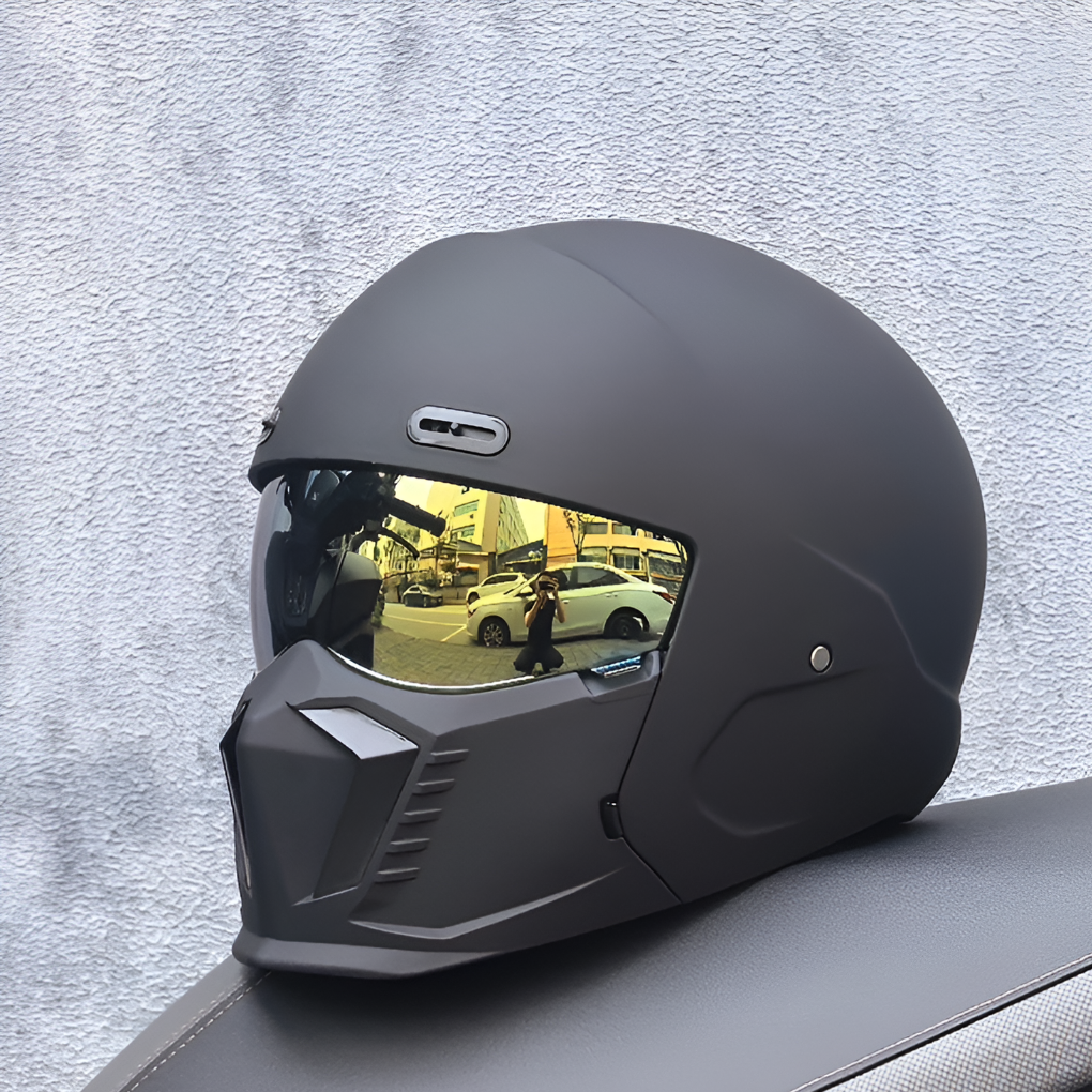 Matte black unisex full face modular motorcycle helmet with integrated visor for rider safety.