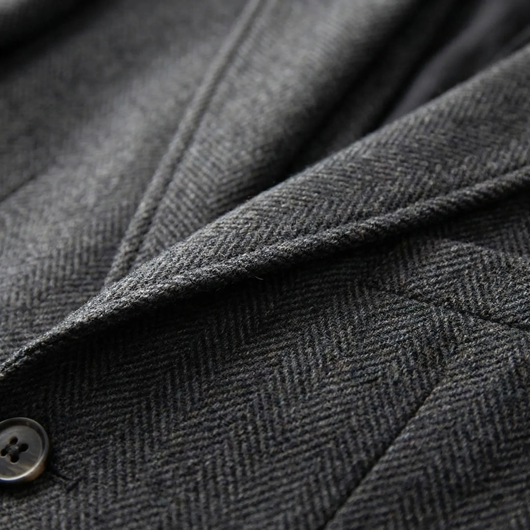 Stylish men's herringbone patterned 3-piece suit. Tailored fit for a sophisticated, classic formal look.
